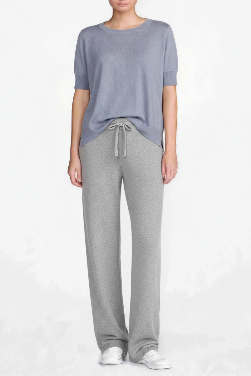 Blue-grey top with grey melange pants same model pose