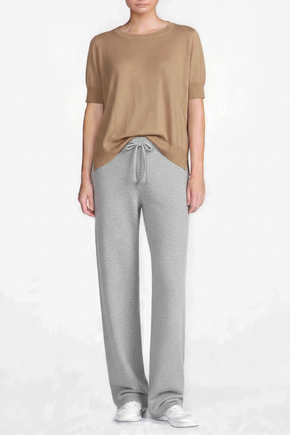 Camel top with grey melange pants same model pose